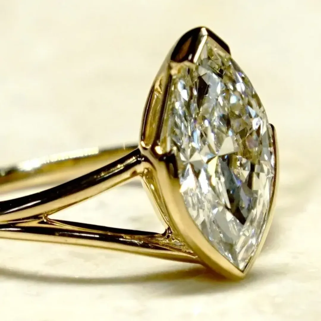/public/photos/live/Half Bezel Marquise Moissanite Spilt Shank Ring 583 (3).webp